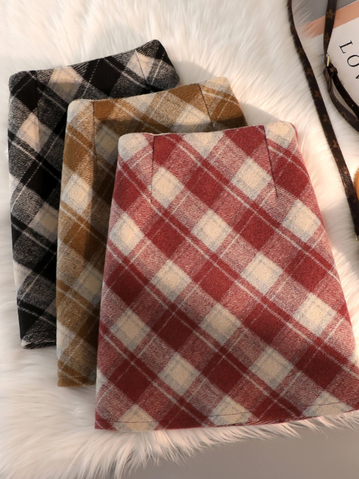 毛呢格子半身裙女秋冬季欧货冬天配毛衣的包臀裙修身显瘦a字短裙