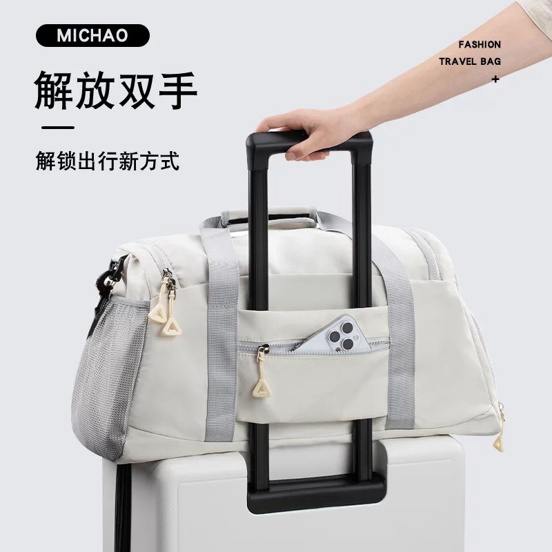 大容量防泼水可套拉杆旅行包图片
