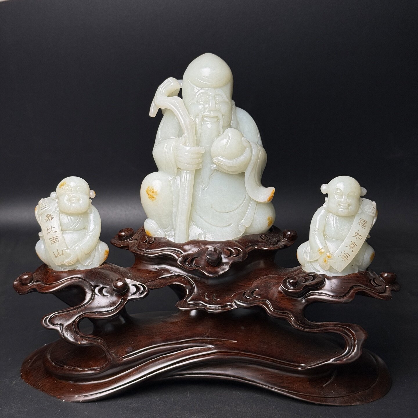 收藏级和田玉寿星童子精雕摆件
