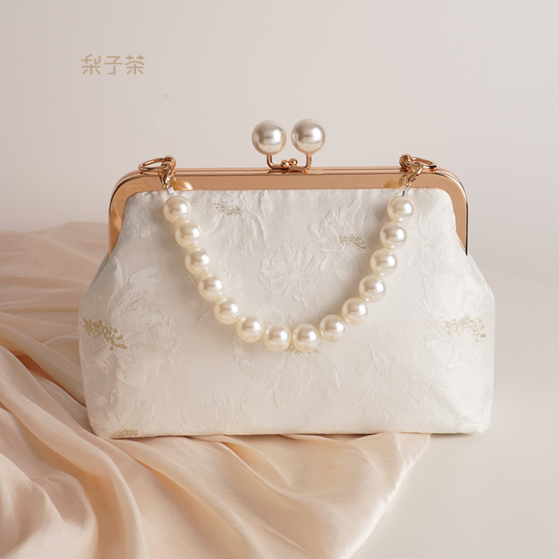 搭配穿旗袍的手提包包