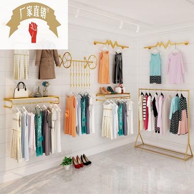 金色墙上挂衣服架子女服装店展示架货架儿童装店铺装饰壁挂式正k