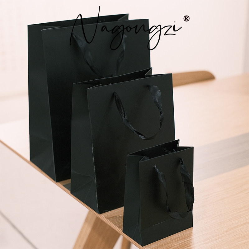 黑色服装手提袋礼品袋加厚白卡纸袋购物袋礼品袋包装袋子批发印刷