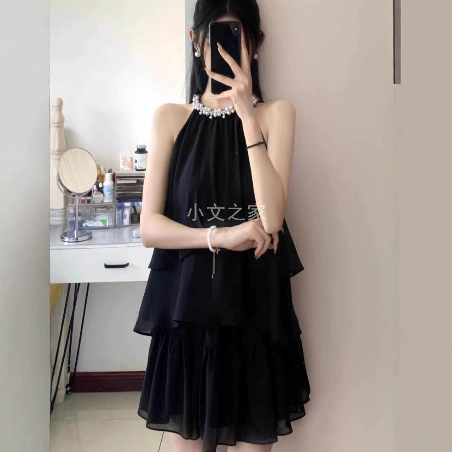 新款女生富家千金风钉珠挂脖上衣