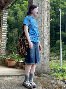 临典蓝色A字牛仔裙女2026夏季新款复古前开叉小个子五分半身裙子
