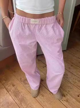 Striped pants with printed wide legs and high waist for a