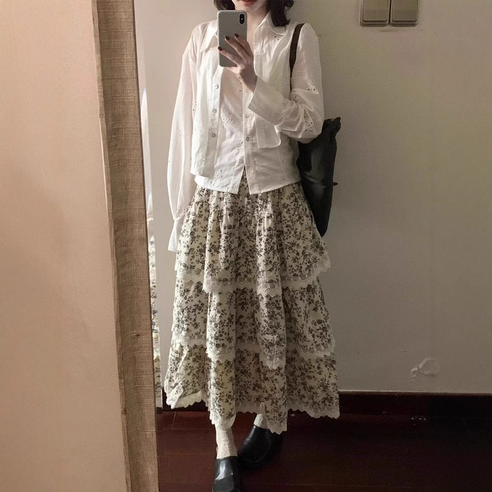 今年流行的女装搭配2025秋冬新款设计感复古碎花宽松厚实半身裙