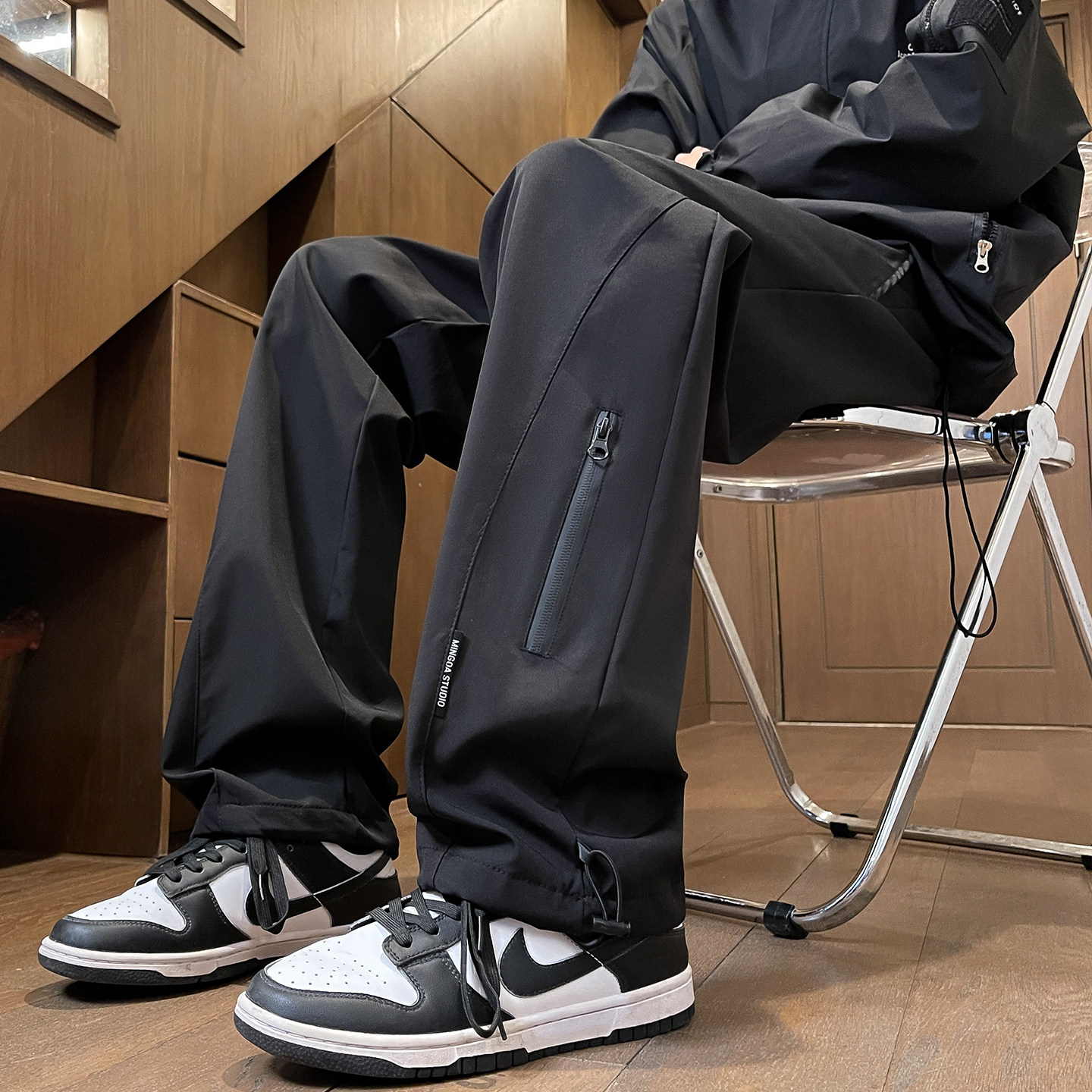 啄木鸟户外登山冲锋裤男款宽松工装运动裤休闲黑色裤子新款春秋季