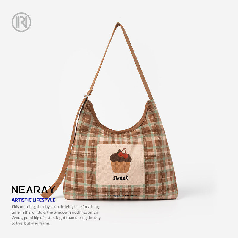 尼睿温柔风气质格纹斜挎包