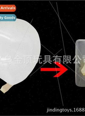 Mobile phone into balloon coin into balloon close-up stage p