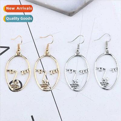 Europe new alloy hollow human face spectrum earrings palm wo