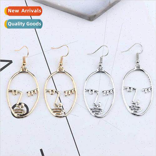 Europe new alloy hollow human face spectrum earrings palm wo