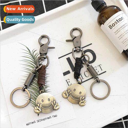 Cute smiley cowhide keychain creative key chain doll bag pen