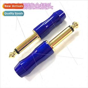 large two pronged Audio gold 6.mm three plug