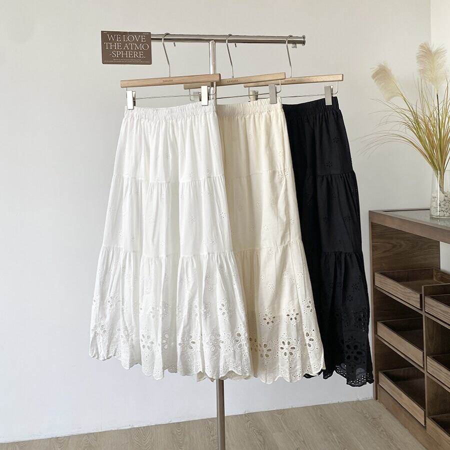 韩式百搭少女蕾丝镂空A字半身裙女春夏季新款高腰遮跨蛋糕中长裙