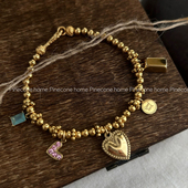 本我 Pinecone home·原创 钛钢纯银招财手饰小金转流苏女手链