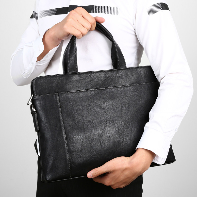 帅桐袋鼠真皮男士大容量托特包2025新款男生公文手提包通勤单肩包