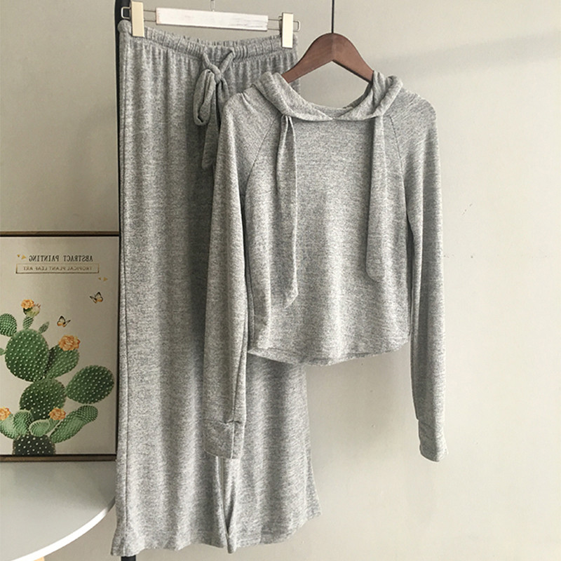 Spring and autumn leisure suit women's Korean version loose hooded long sleeved T-shirt + wide legged pants fashion foreign style solid color two-piece set