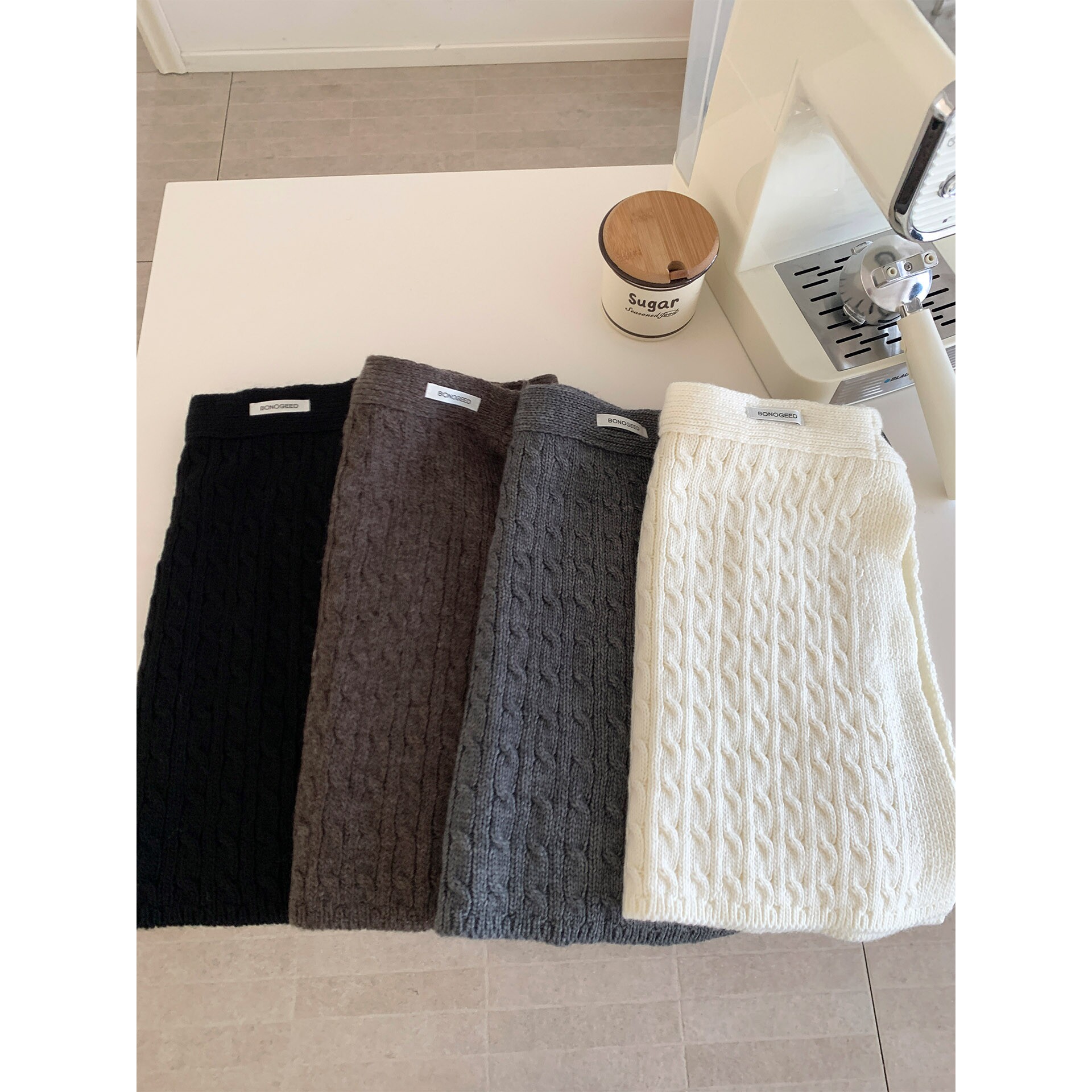 韩系纽扣针织毛线屁帘女秋冬新款时尚百搭氛围感保暖叠穿半身裙子