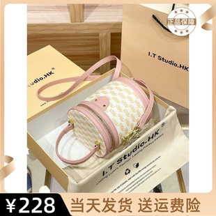 春夏高级感小众手提圆柱形圆筒斜挎包 香港真皮水桶包包女2025新款