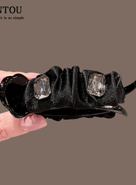 高级感丸子头抓夹女2024新款后脑勺发夹盘发固定神器气质发卡头饰