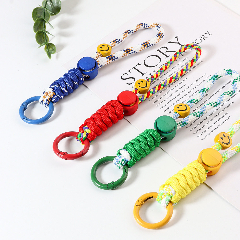 Color blocking smiley face ring mobile phone lanyard