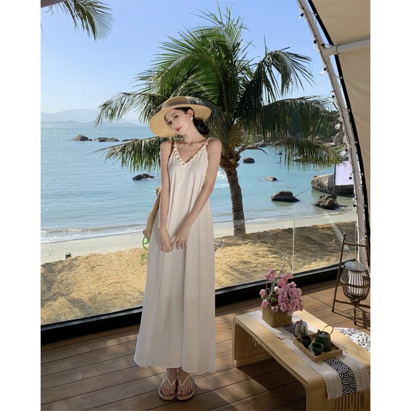 2026新款白色宽松领海边沙滩露背度假风贝壳吊带连衣裙长裙女有里