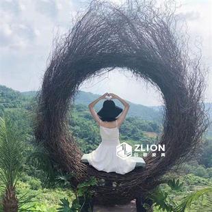 巴厘岛户外鸟巢景区网红打卡秋千婚纱拍摄道具椅爱心民宿落地躺椅