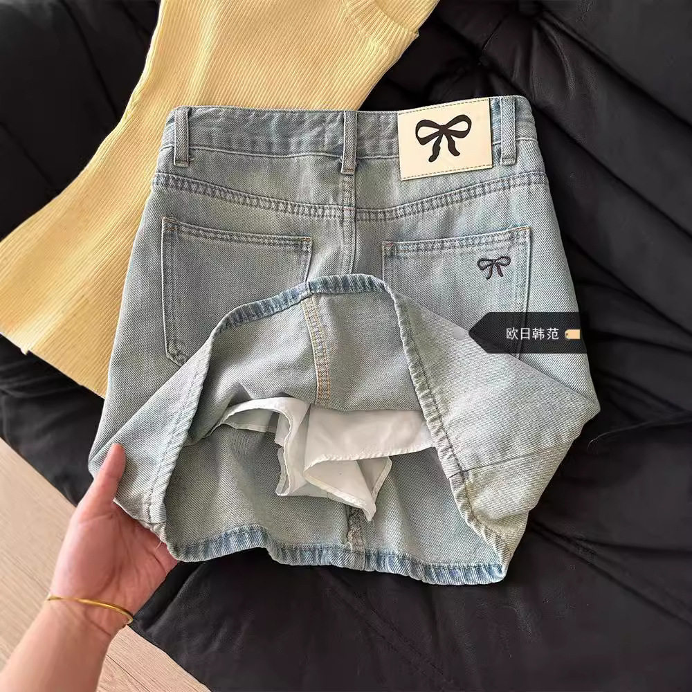 大码韩系蝴蝶结刺绣皮标牛仔半身裙女春秋季高腰显瘦包臀a字短裙