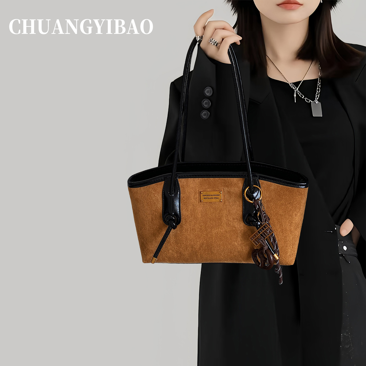 【品牌直营】复古麂皮手提法棍包