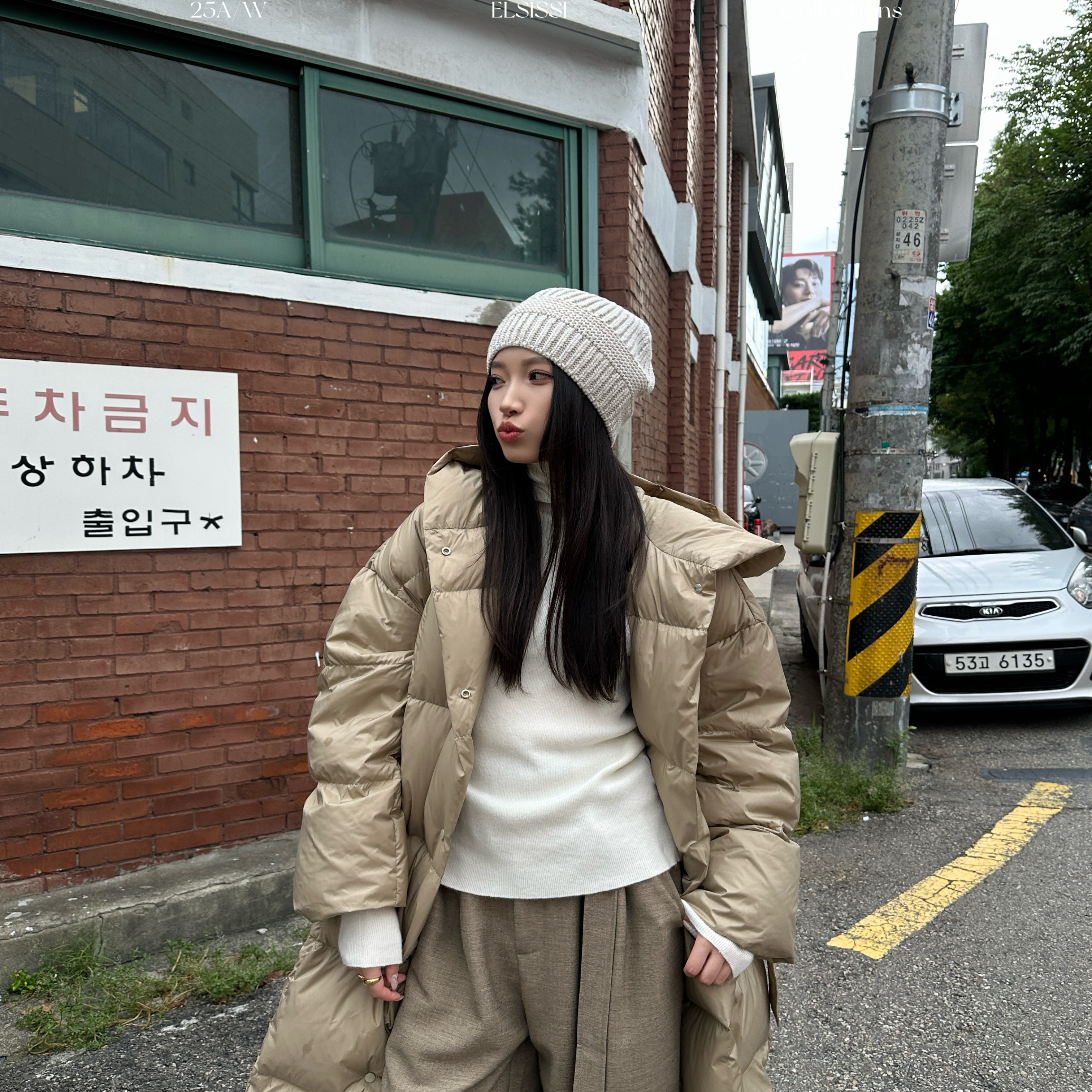 爱姐家连帽双排绑带长款羽绒服