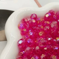 Темно-розовые бусины из рогов разных размеров (50 г в пакетике)