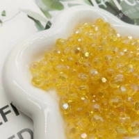 Желтые бусины из рогов разных размеров (50 г в пакетике)