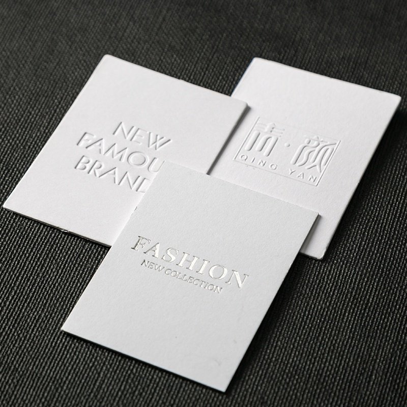 牌定雪牌特种服装超特种订做艺术吊牌白吊纸吊纸制服卡欧牌吊