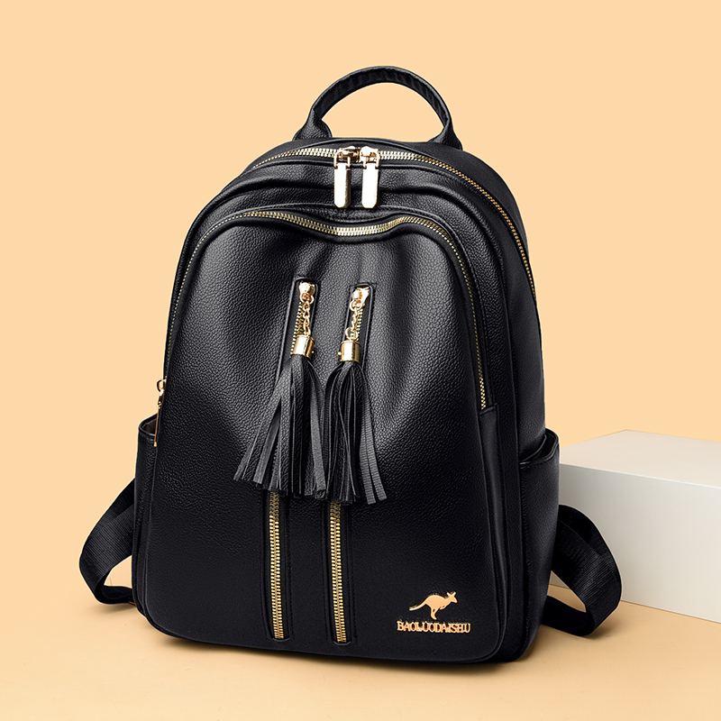 流苏装饰大容量轻便通勤双肩包