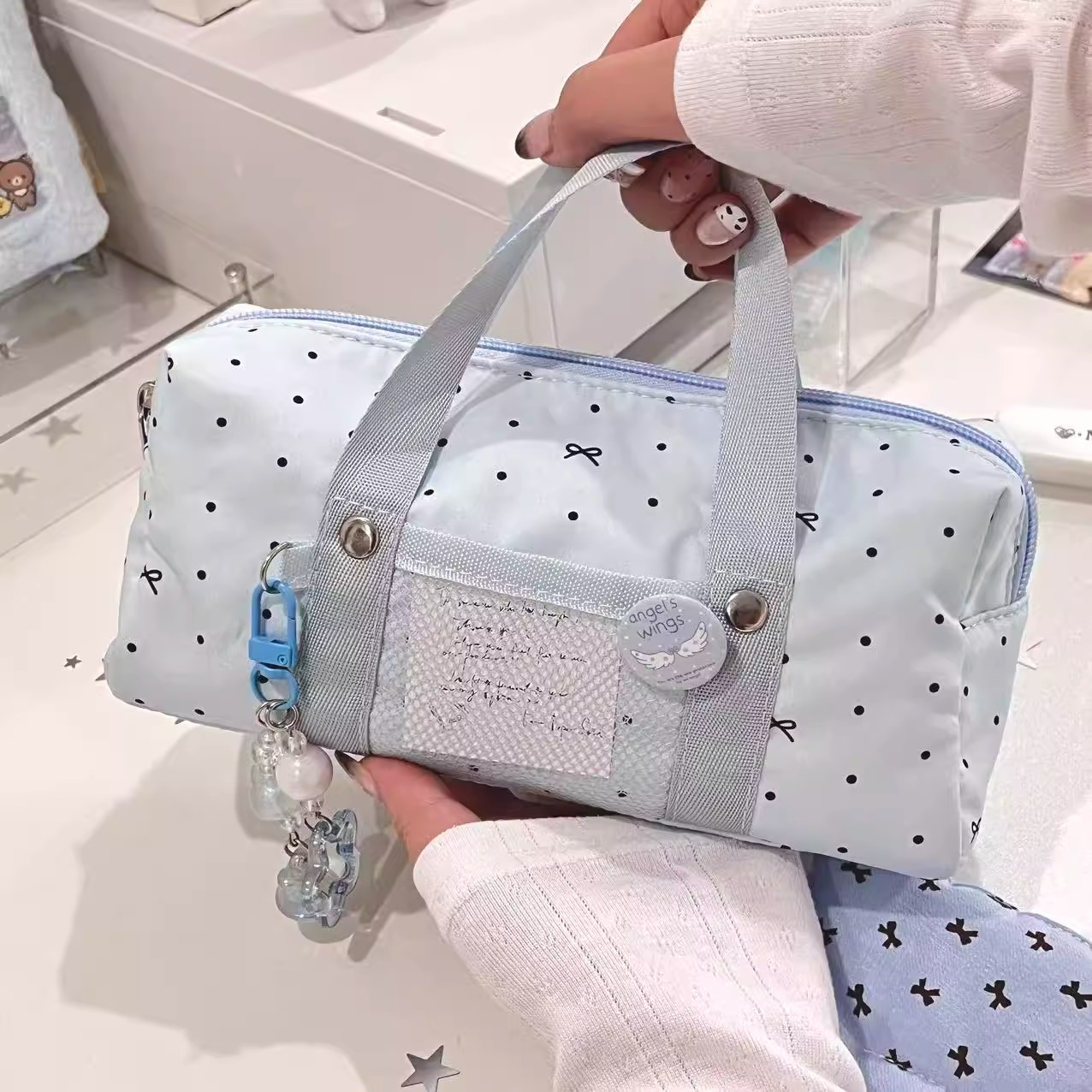 ins原创蓝色蝴蝶结手提笔袋少女心简约设计款学生文具袋便携小清新韩版简约波点可爱简约高颜值小巧便携笔袋l