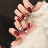 2025年酒红色猫眼新年发财手工穿戴甲毛绒蝴蝶结美甲成品指甲贴片