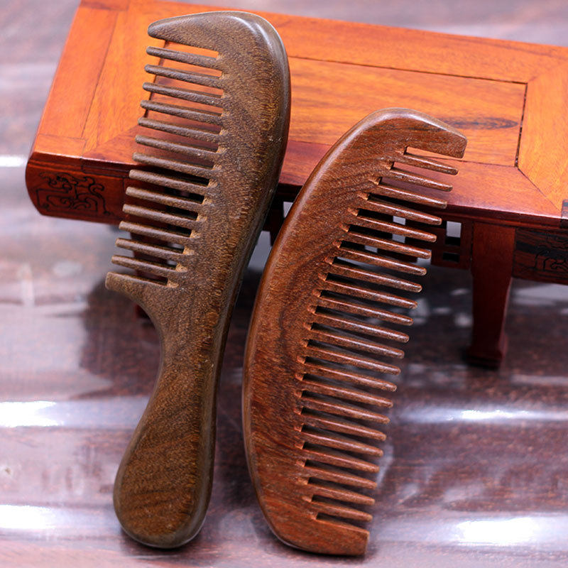 天然檀木梳子 家用按摩宽齿卷发梳 整木凹槽梳齿黑金檀木梳子