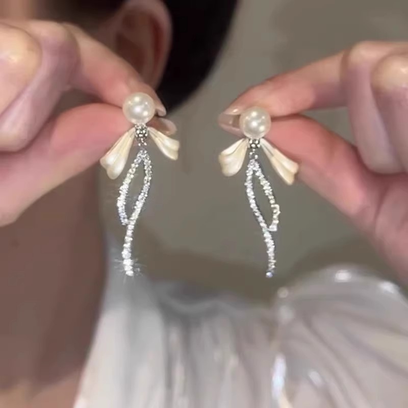 珍珠蝴蝶结流苏耳环女2025