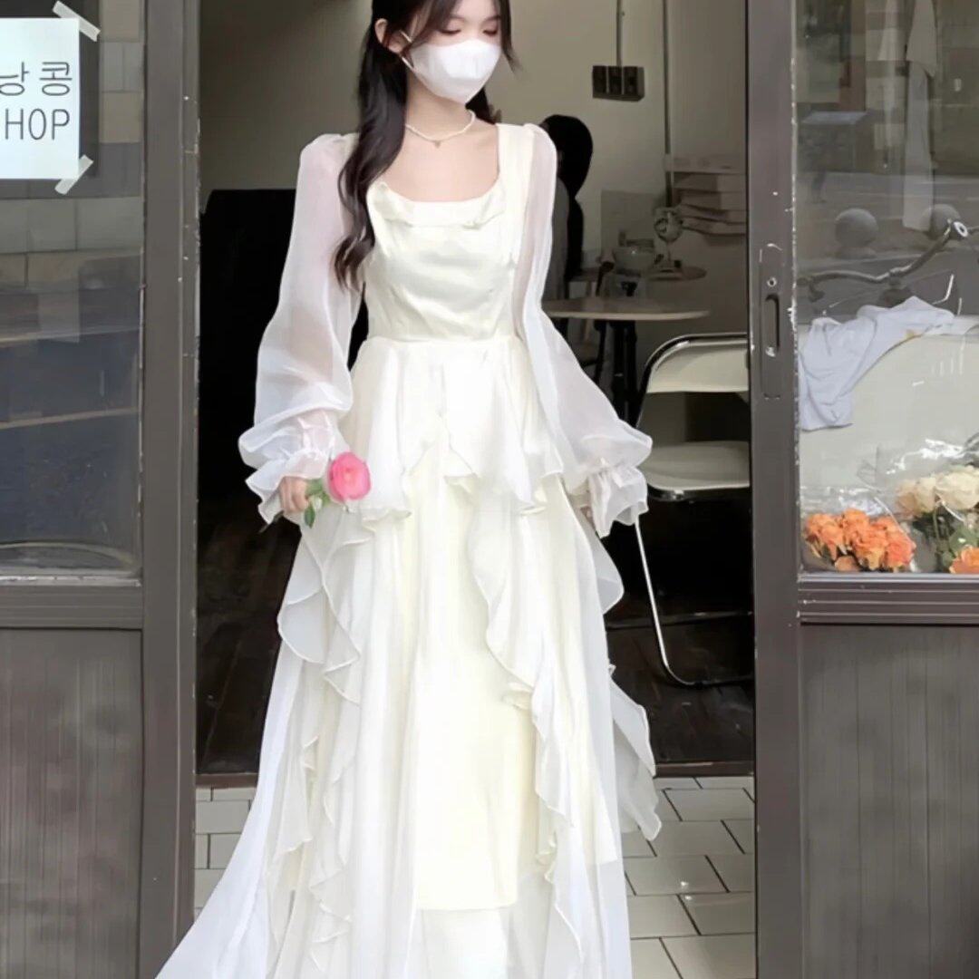 法式温柔白色荷叶边连衣裙仙女秋冬气质高级感生日在逃公主长裙子