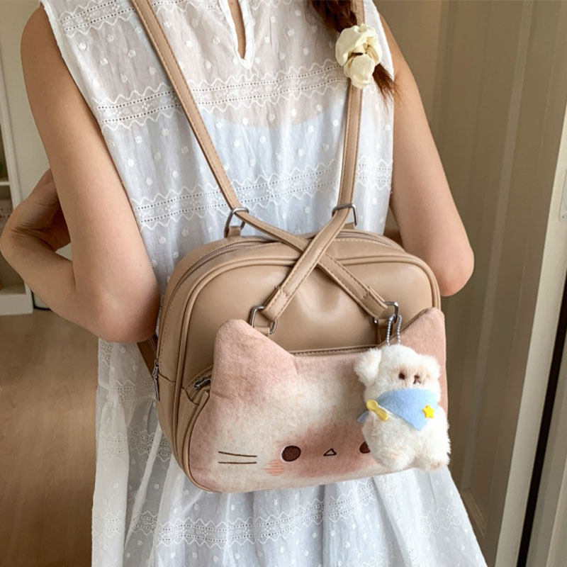 可爱卡通烤面包小猫双肩包2025新款小众百搭单肩斜挎包多功能背包