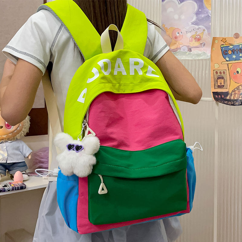 日系多巴胺少女撞色双肩包2026新款轻便旅游背包大容量高颜值书包