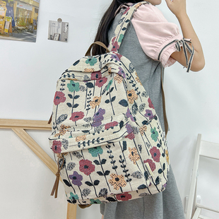 原创设计小花书包女大学生小众感简约百搭复古背包女生高中双肩包