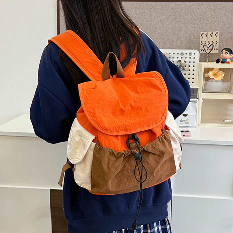 高颜值撞色拼接双肩包女2025新款轻便旅游通勤背包学生休闲小书包