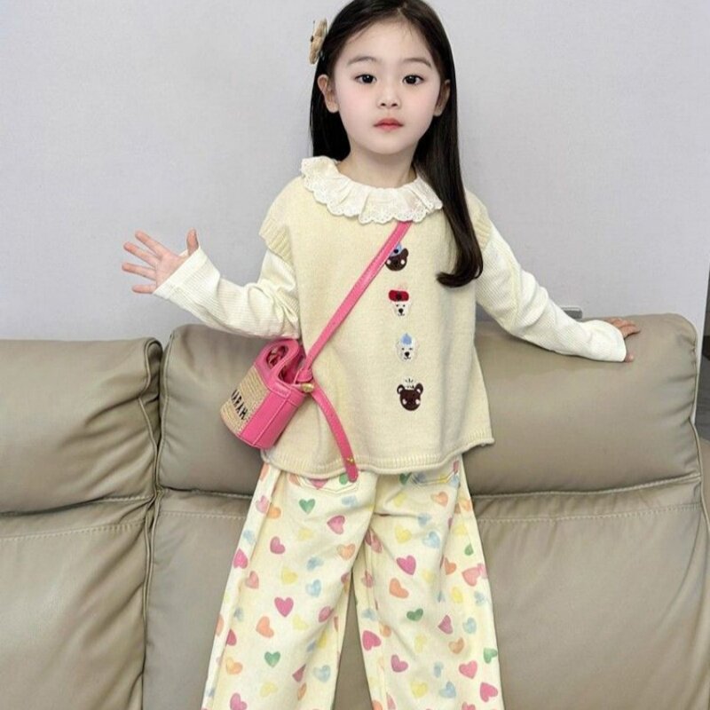 韩版女童2026春季新款甜美奶黄色小狗马甲背心女宝宝叠穿爱心裤子