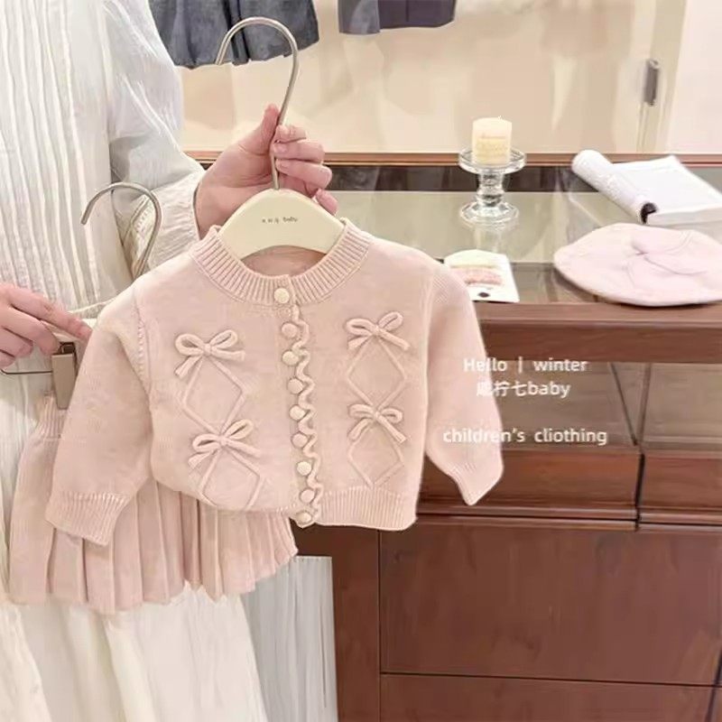 韩版女童2026春秋新款粉色针织套装小女孩蝴蝶结毛衣半身裙两件套