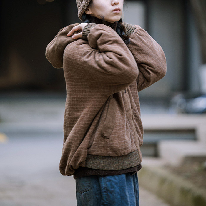 封面是花提花格香云纱连帽短外套