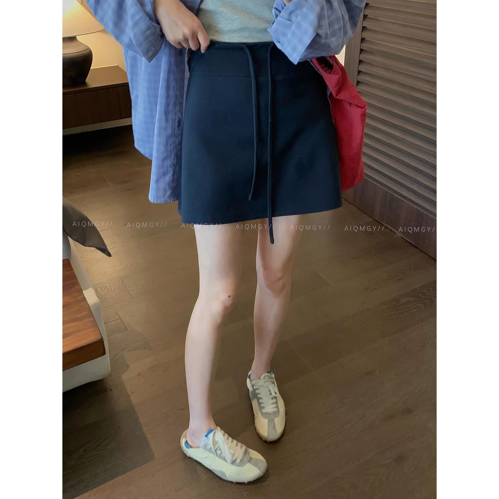 爱情魔鬼鱼 藏蓝色抽绳休闲半身裙女2026夏季新款高腰百搭A字短裙