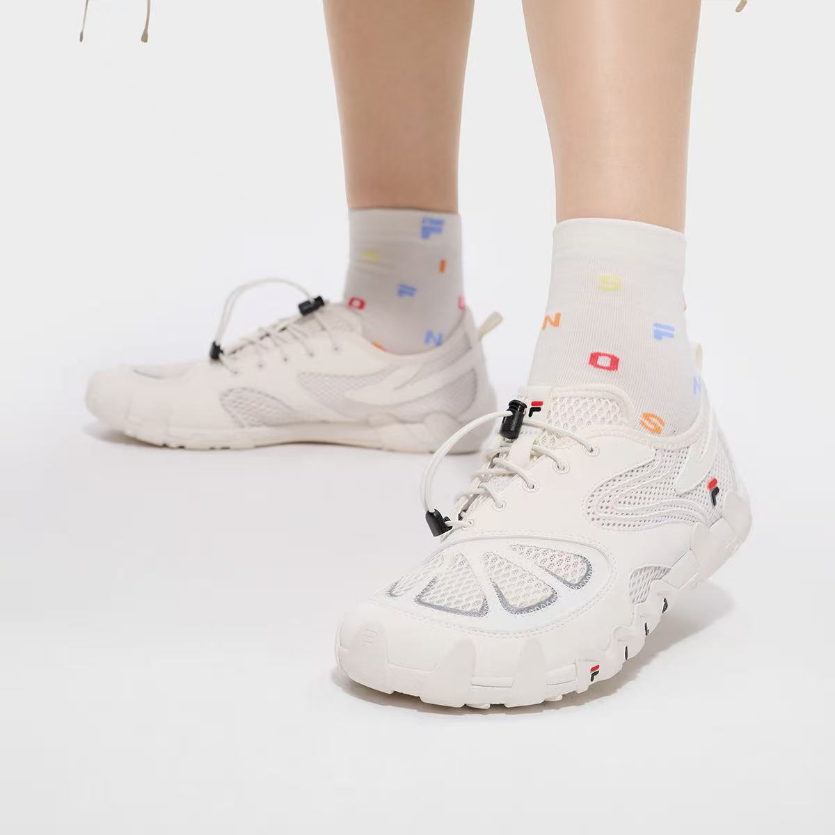 FILA FUSION潮流运动女士小丑鞋薄底鞋T12W621519F