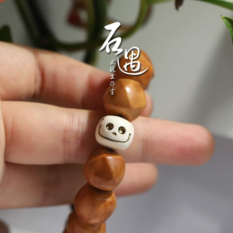 石遇猛犸天然隔珠保真