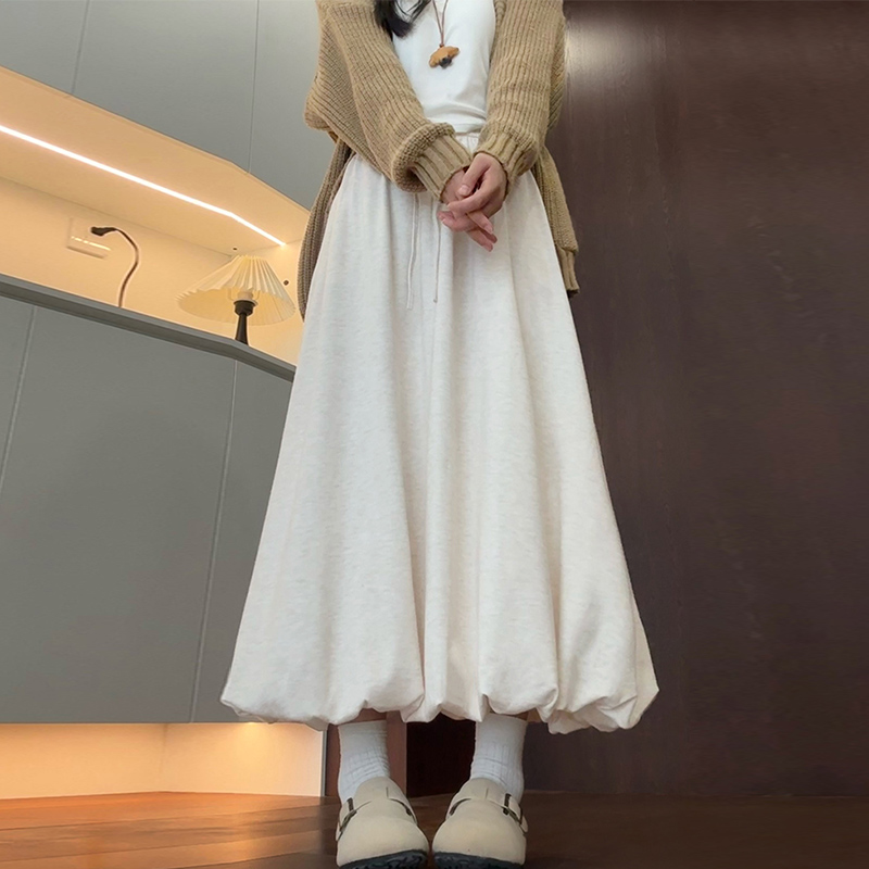 杏色糯米半身裙女秋季2025新款高腰a字宽松针织伞裙小个子花苞裙